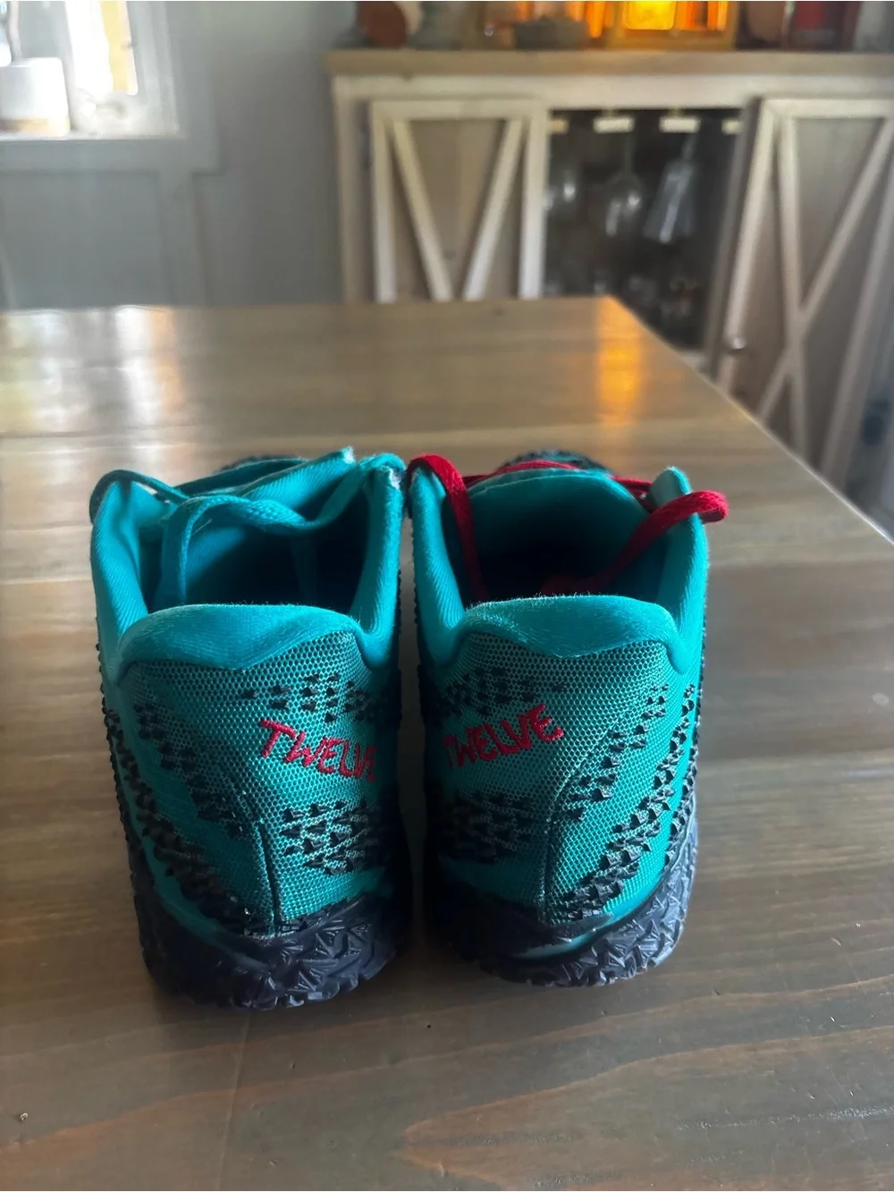 Men's Athletic Nike Shoes in Teal with Red Accent
